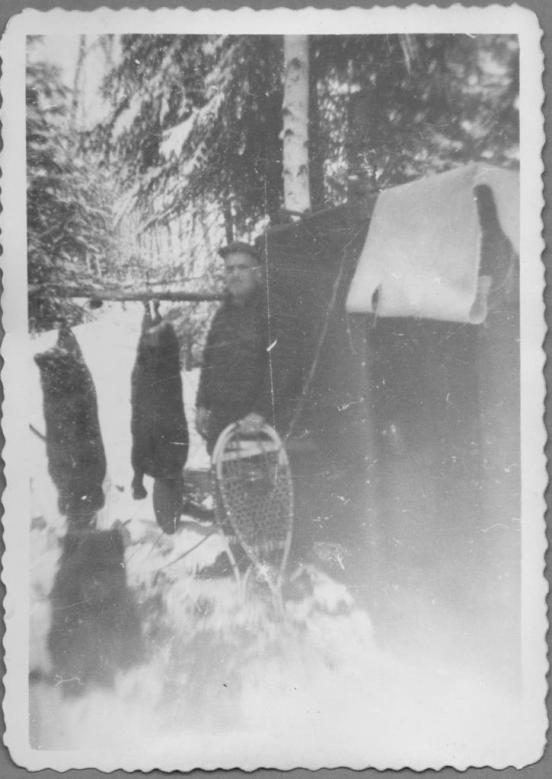 A Man and His Dog in Camp